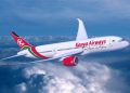 A Kenya Airways Boeing 787-8 Dreamliner in flight.